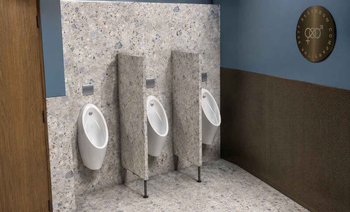 TBRC facilities with terrazzo partitions and brass detailing